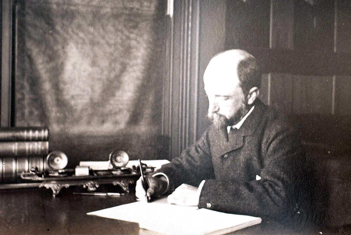 Henry Brooks Adams at work at home